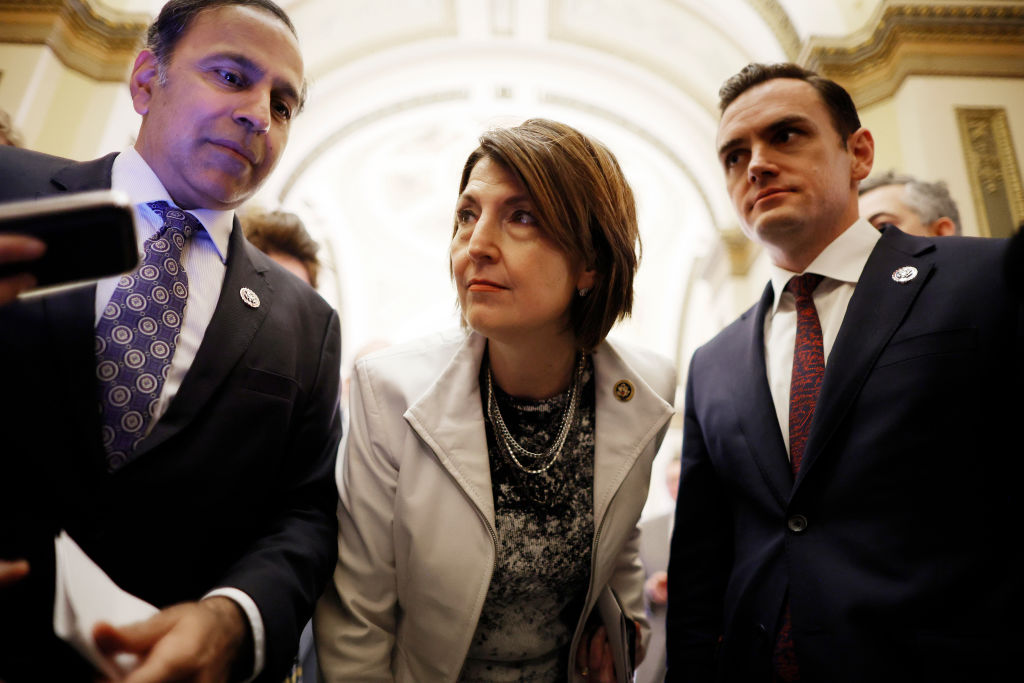 Cathy McMorris Rodgers, Raja Krishnamoorthi, and Mike Gallagher in the Capitol building