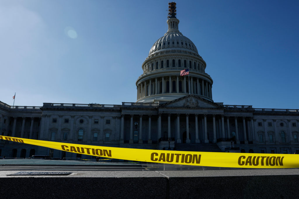 Capitol Building with yellow caution tape outside the front.