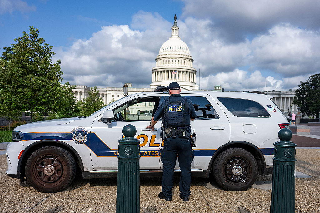 An 18-year-old wearing a tactical vest and carrying a shotgun charged toward the Capitol on Tuesday and was quickly arrested, according to USCP.