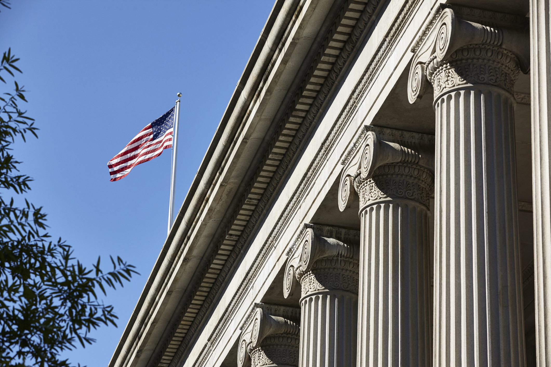 The American Flag flying over the Treasury Department